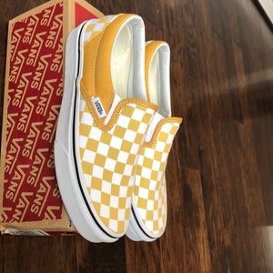 YELLOW CHECKERBOARD SLIP-ON VANS
